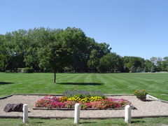flower bed in front of open green space